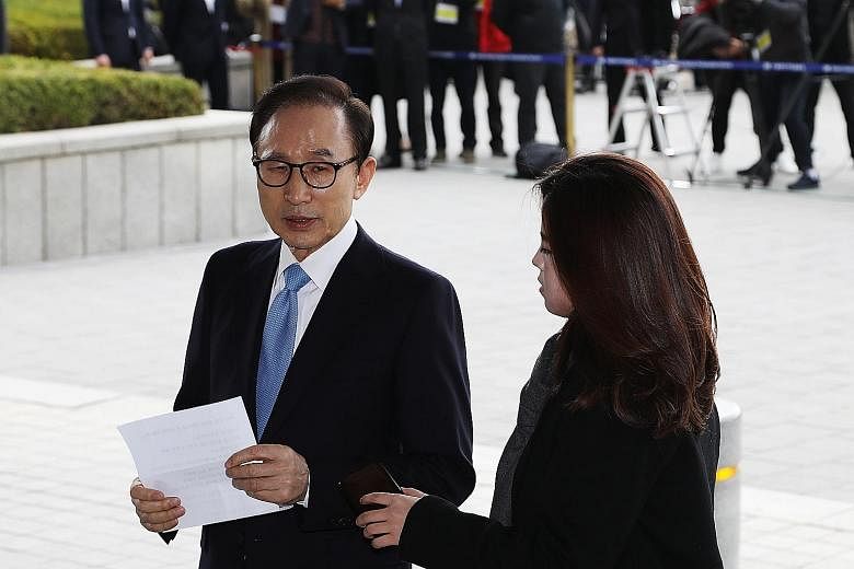 Mr Lee Myung Bak, who denies most of the allegations, is suspected of taking 11 billion won (S$13.5 million) in bribes.