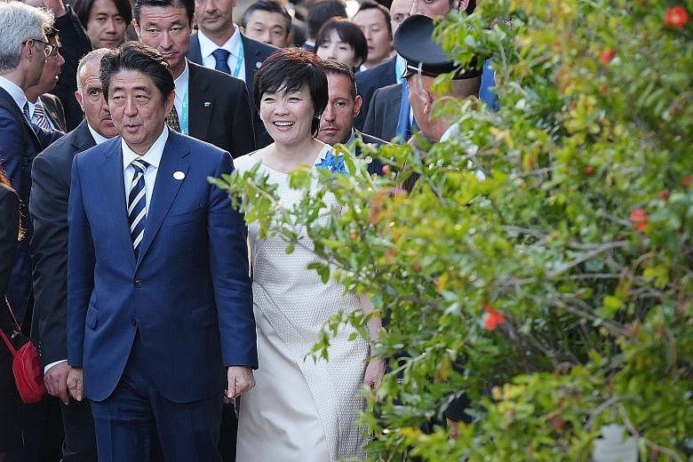 Prime Minister Shinzo Abe and his wife Akie arriving for a concert at the ancient Greek Theatre of Taormina during the Group of Seven summit in Sicily, Italy, last May.