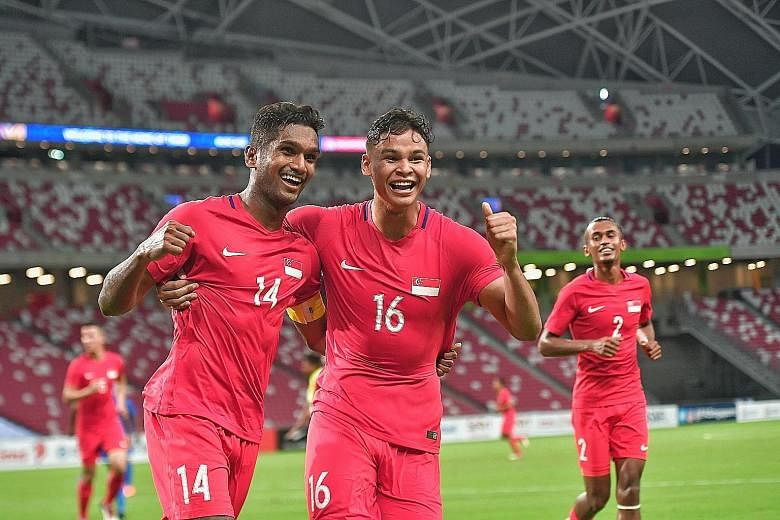Irfan Fandi joining in the celebrations after Singapore captain Hariss Harun opened accounts against the Maldives in their international friendly. Despite taking a 3-1 lead, the Lions were made to sweat after the visitors pulled a late goal back.