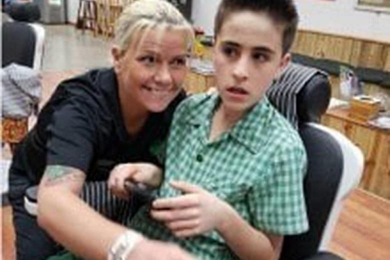 Barber Lisa Ann McKenzie's experience cutting autistic child Jordie Rowland's hair motivated her to open her own shop and work with more children who have special needs.