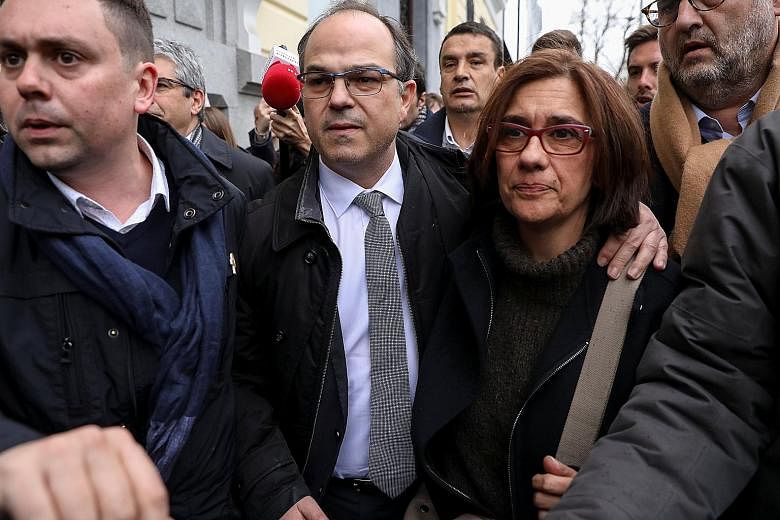 Catalan presidential candidate Jordi Turull leaving the Supreme Court in Madrid with his wife last Friday. He was among those held in custody.