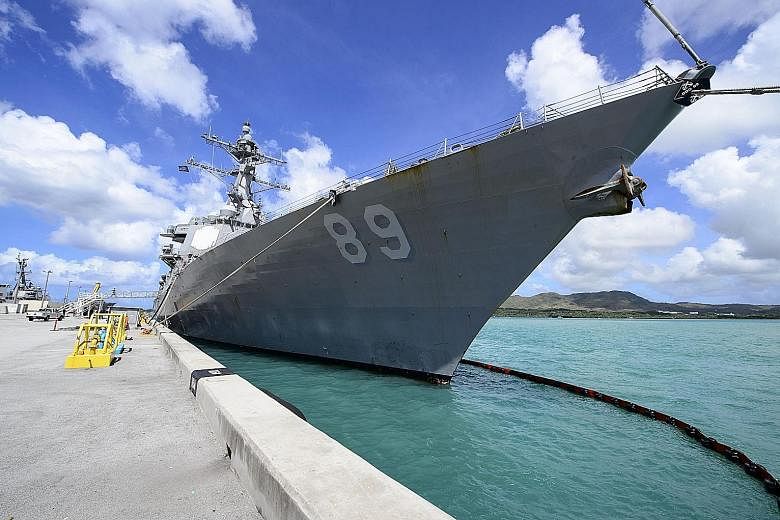 US Navy destroyer Mustin, which carried out the latest "freedom of navigation" operation, docked in a port in Guam. A US Pacific Fleet spokesman said that such operations were routine and would continue.