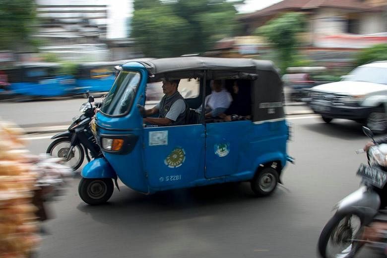 Ride-hailing apps run Indonesian tuk-tuks off road | The Straits Times