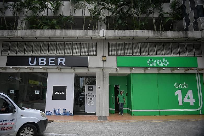Grab and Uber offices at Midview City in Sin Ming Lane. Grab says it hopes the combined operations will create a better experience for both drivers and passengers.