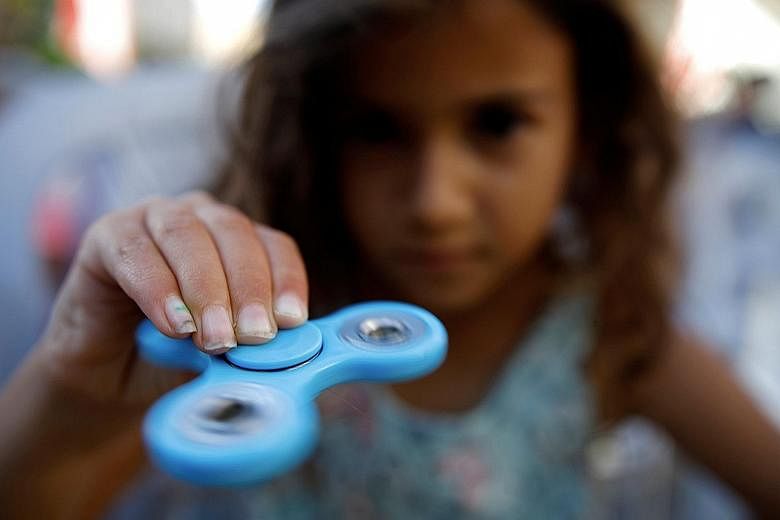 The battery cases in toys like fidget spinners must be secure so that young children cannot open them and remove the batteries, advises Spring Singapore.
