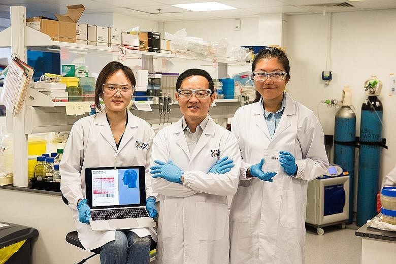 From left: PhD student Lim Su Bin from the NUS Graduate School for Integrative Sciences and Engineering; Professor Lim Chwee Teck, principal investigator of the Mechanobiology Institute; and Dr Khoo Bee Luan, senior postdoctoral associate at the Sing