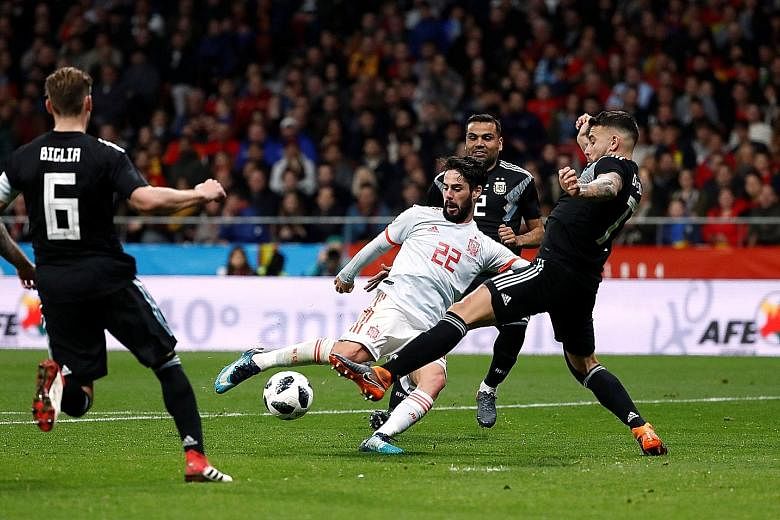 Spain's Isco scoring their sixth goal and completing his hat-trick in the 6-1 friendly victory over Argentina in Madrid on Tuesday. It was his first career treble and he looks set to be in Spain's starting line-up at the World Cup.