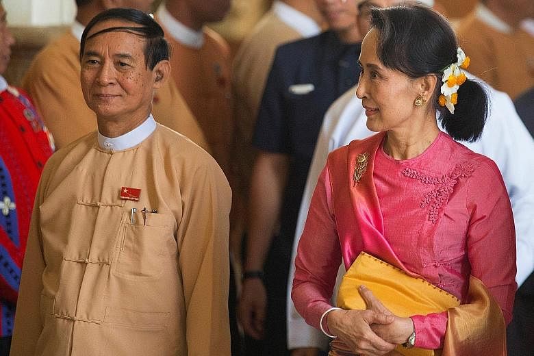 Myanmar's State Counsellor Aung San Suu Kyi and Mr Win Myint, who has just been elected President.