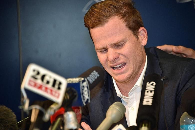 Steve Smith overcome by emotion at Sydney Airport, where the former Australian skipper failed to complete a news conference to apologise for his role in the ball-tampering scandal in South Africa. He lost his captaincy and was handed a 12-month suspe