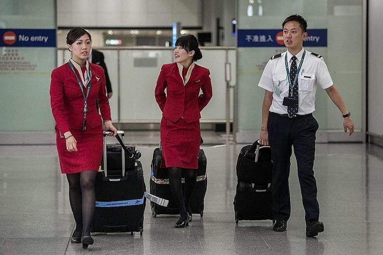 Many of Cathay Pacific's female flight attendants have expressed concern over wearing short skirts while working.