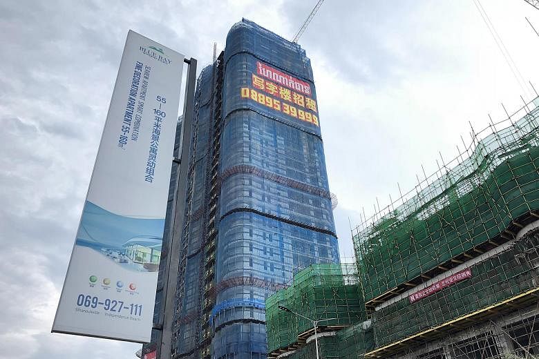 The Blue Bay casino and condo project is a sign of massive Chinese investment in the Cambodian port city of Sihanoukville. Thirty casinos have already been built and 70 more are under construction.