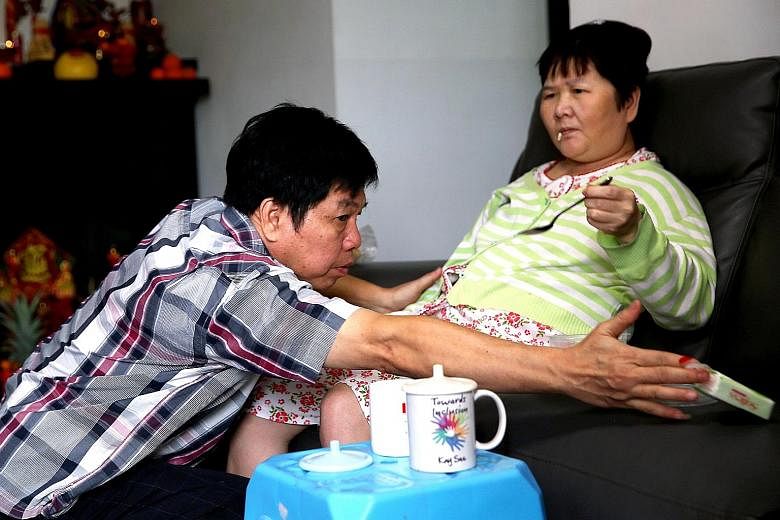 Madam Ang Liu Kiow, seen here with her husband Leong Loon Wah, was hit by an e-scooter and suffered severe head injuries.
