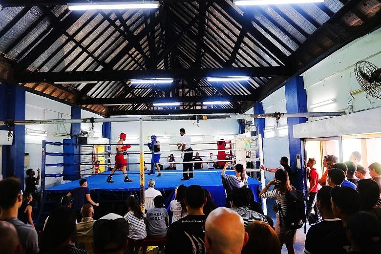 A 120-strong crowd gathering at the Farrer Park Boxing Gym to watch the National Boxing Championship on Saturday. There was a similar turnout yesterday as the Singapore Amateur Boxing Association prepares to leave its home since 1968.