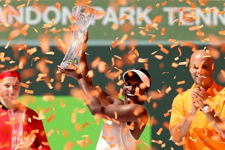 Sloane Stephens' relentless defence and Jelena Ostapenko's 48 unforced errors proved the difference as the American celebrates with the Miami Open trophy.