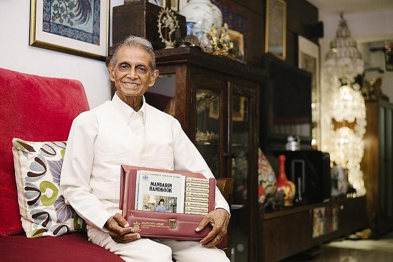 Dr Sivam with the self-study language handbooks that he came up with at the Europhone Institute, which offered languages such as French and Vietnamese. Dr K. P. Sivam at his home in Serangoon with a Mandarin language kit comprising guides, textbooks 