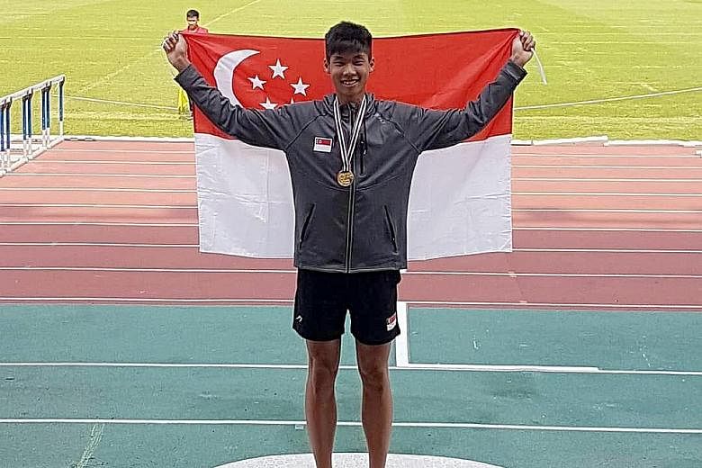 A happy high jumper Kampton Kam with his gold medal at Thammasat Stadium in Bangkok yesterday. He is aiming for the Asian junior championships, with the Youth Olympics a long shot.