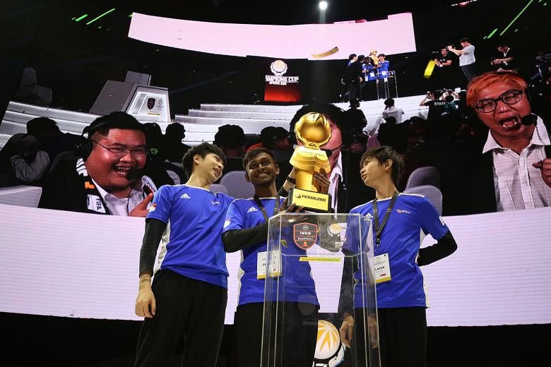 (From left) Si Jun Li, Amraan Gani Musa Bakar and Joseph Yeo beat Thailand 3-0 in the final of the East Asian Champions Cup Spring 2018 on Sunday, which qualified them for the Fifa eWorld Cup in June.