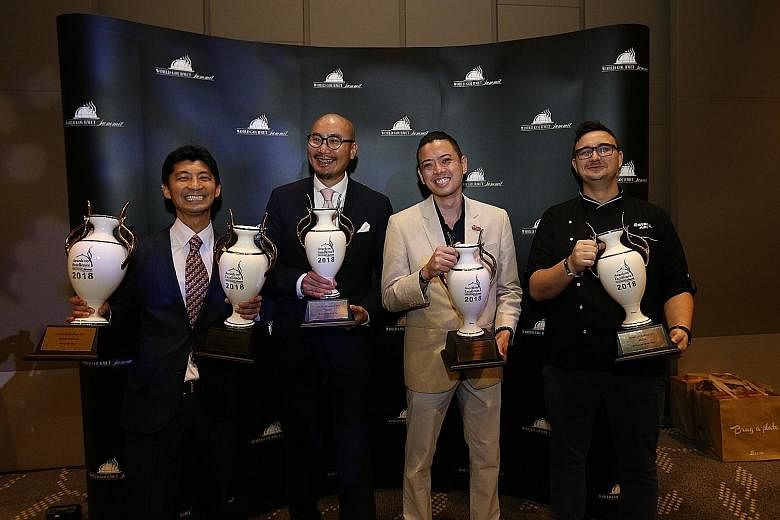 (From left) Mr Daisuke Kawai of La Terre, winner of Bar Manager of the Year, Old World Wine List of the Year and Bar of the Year; Mr Ricky Ng of Blue Lotus Concepts International is Restaurateur of the Year; Angus Chow of Boruto is Chef of the Year; 