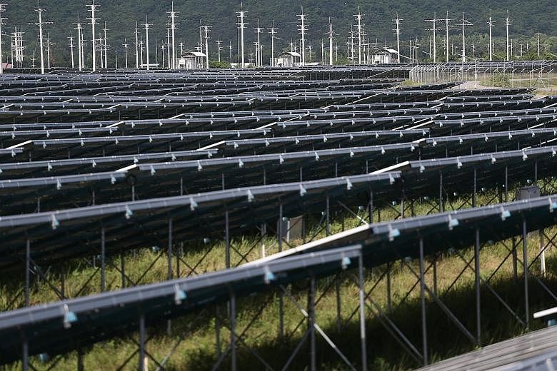 A solar power plant in Thailand's Phetchaburi province. In the energy sector, Asean has about 77 renewable energy projects in hydro, solar, wind, geothermal and biomass.