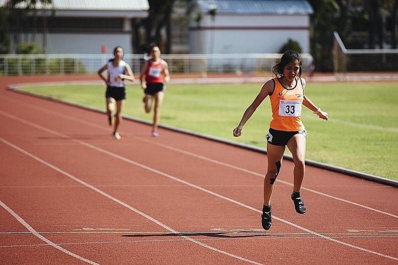 Singapore Sports School's Diane Hilary Pragasam clinched her fifth straight schools' 400m title when she won the A Division race yesterday morning at Choa Chu Kang Stadium. The 17-year-old won in 1min 01.50sec, ahead of Amanda Woo from Hwa Chong Inst