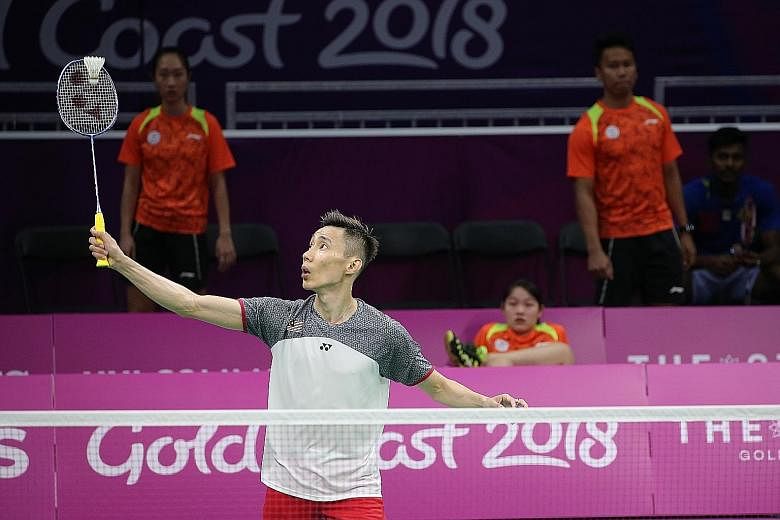 Singapore shuttlers Tan Wei Han, Ong Ren-Ne and Danny Bawa Chrisnanta observing the master Lee Chong Wei at work on Tuesday, as the Malaysian sparred with national team-mate Soniia Cheah at the Carrara Indoor Sports Centre before the start of the Com