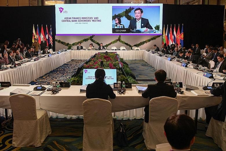Mr Heng at yesterday's meeting of Asean finance ministers and central bank governors.