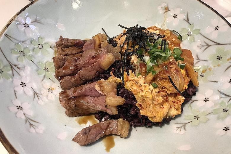 The Yes Sir! Yes Sir! bowl ($12) comes with sirloin steak, a purple multi-grain rice called japgokbap, kimchi omelette and a drizzle of teriyaki sauce.