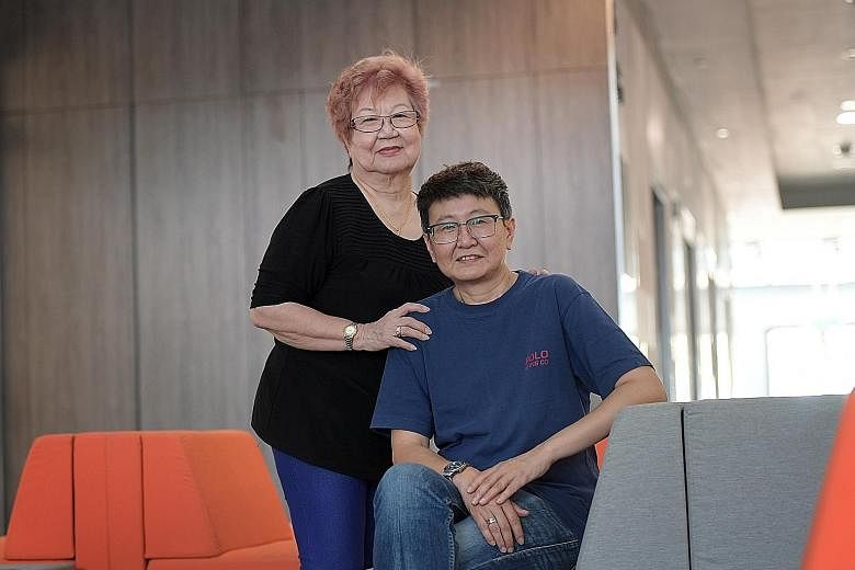 Ms Chan Yoke (seated) with her mother Lina Toh, 74. Ms Chan, who completed chemotherapy two years ago, still finds it hard to focus and becomes tired easily.
