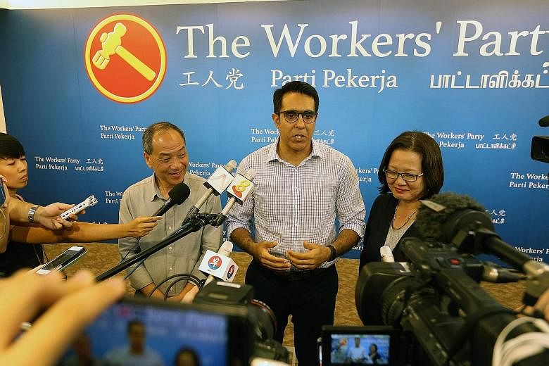 New WP chief Pritam Singh addressing the media yesterday with his predecessor Low Thia Khiang and chairman Sylvia Lim. Mr Singh said his immediate task is to reach out to party members for their views and vision for the party, adding that it was impo