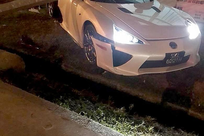 The driver of the white Lexus LFA is believed to have lost control of the vehicle. A video posted on Facebook shows the car swinging from side to side before veering sharply to the left, cutting in front of a bus. It stopped only when it crashed into