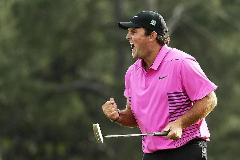 American Patrick Reed shows his jubilation after making par on the 18th green during the final round of the Masters to win by a single stroke over compatriot Rickie Fowler.