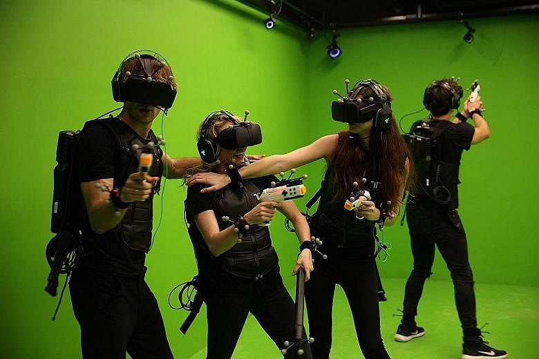 Hong Kong-based Sandbox VR (above) is the latest in Singapore to offer gamers a chance to immerse themselves in a virtual world.