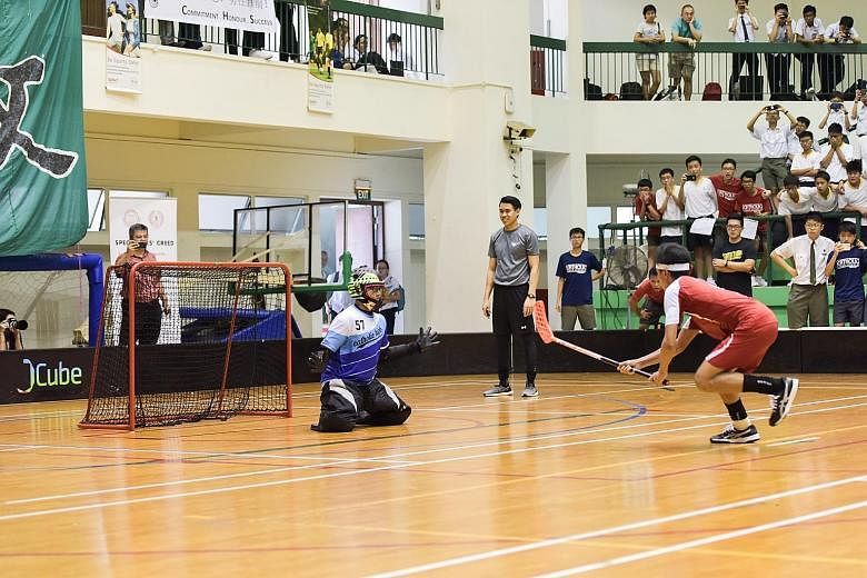 From top: Bukit Merah Secondary players celebrating Shin Thant's equalising goal in the last minute of normal time. John Alicante Embile's penalty whizzing past the Catholic High goalkeeper to give Bukit Merah their first B Division boys' floorball t