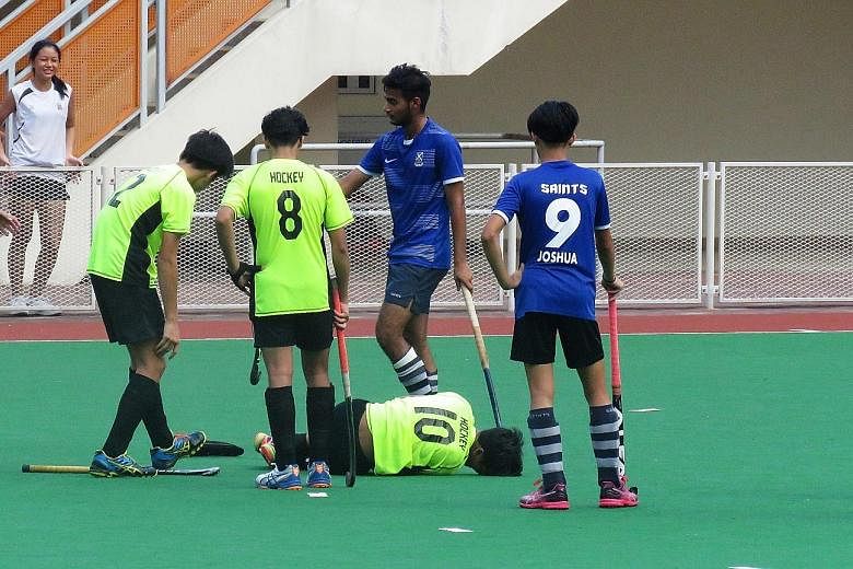 Northland's Muhammad Raihan Adris on the ground with an ankle injury during the match. Northland won 4-3, taking the bronze.