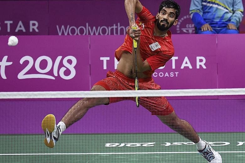 Kidambi Srikanth hitting a return against Lee Chong Wei on the way to winning in straight games last Sunday. That put India 2-0 up against Malaysia in the badminton mixed team event at the Commonwealth Games and they eventually won 3-1.