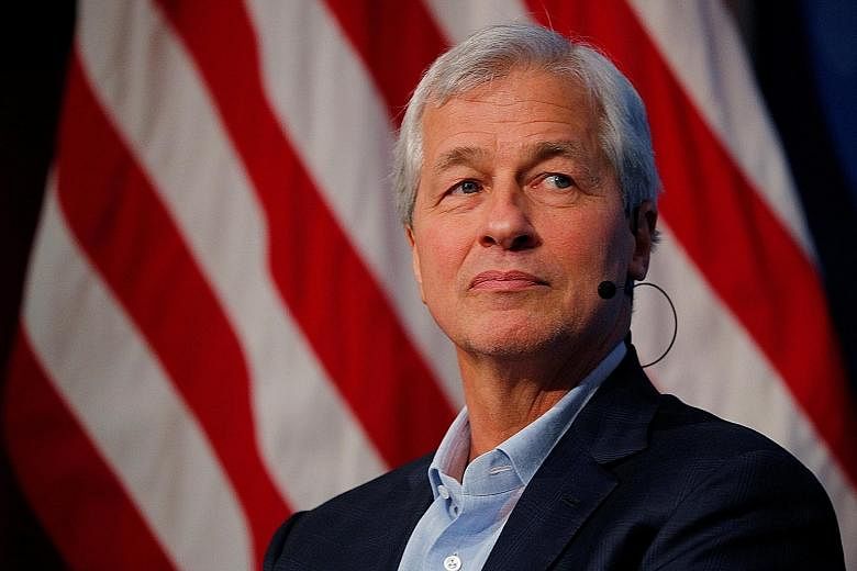 Mr Jamie Dimon says jobs are being created and wages rising, while consumer credit is strong.