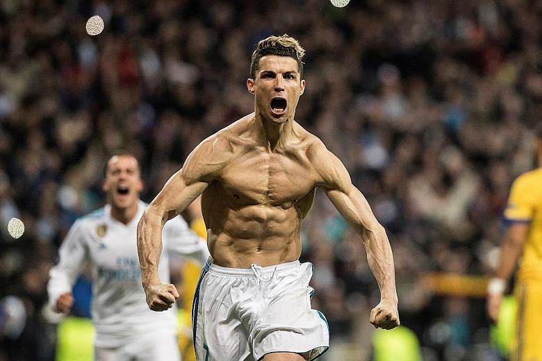 Real Madrid's Cristiano Ronaldo loses his shirt but not his scoring touch as he sent the Spanish giants through to the semi-finals of the Champions League with his penalty goal in stoppage time. It was his 120th goal in the competition. Real advanced