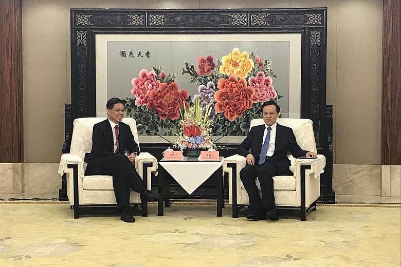 Minister in the Prime Minister's Office Chan Chun Sing (left) meeting Chongqing party boss Chen Min'er yesterday in the south-western Chinese city of Chongqing, where they noted the potential to deepen collaboration.