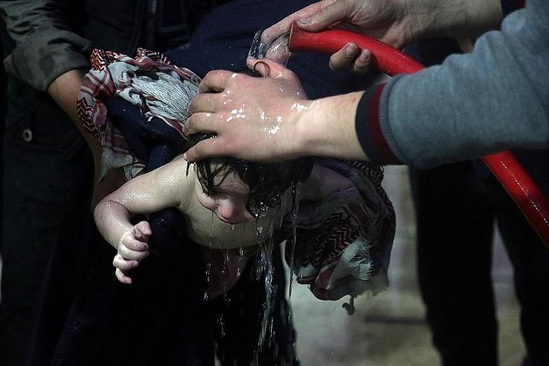 A child being treated in a hospital last Saturday in Douma, Syria's eastern Ghouta region, after a suspected chemical attack by President Bashar al-Assad's regime. The destruction of Syria's chemical weapons stocks is virtually impossible now, since 