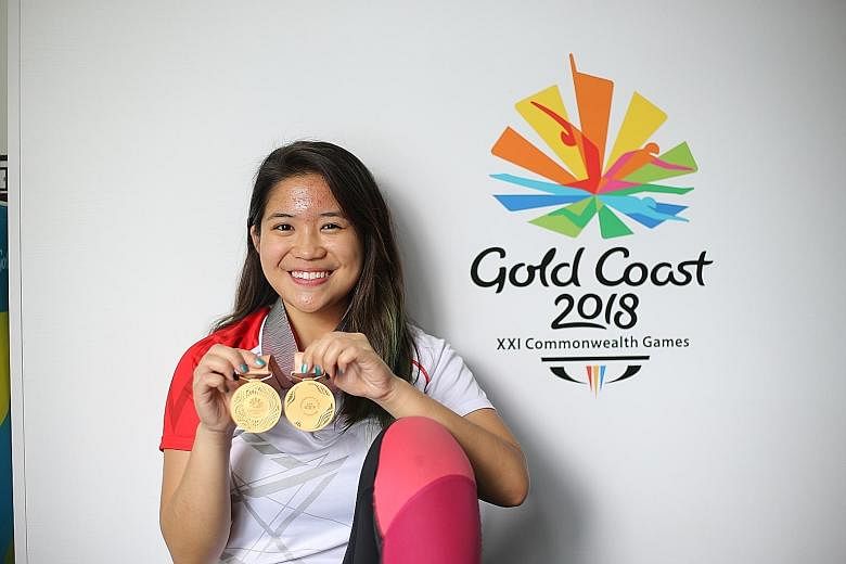 Martina Veloso with her two Commonwealth Games gold medals, which she wants engraved with the events and her name.