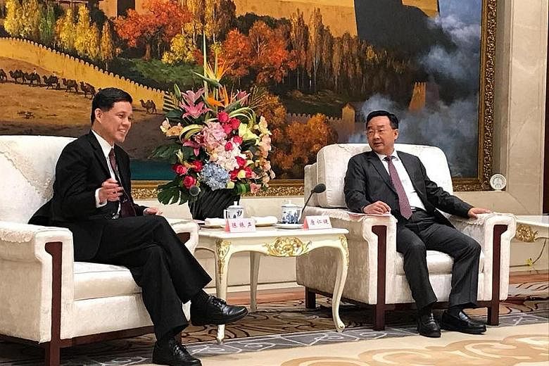 Minister in the Prime Minister's Office Chan Chun Sing meeting Gansu Governor Tang Renjian in Lanzhou yesterday.