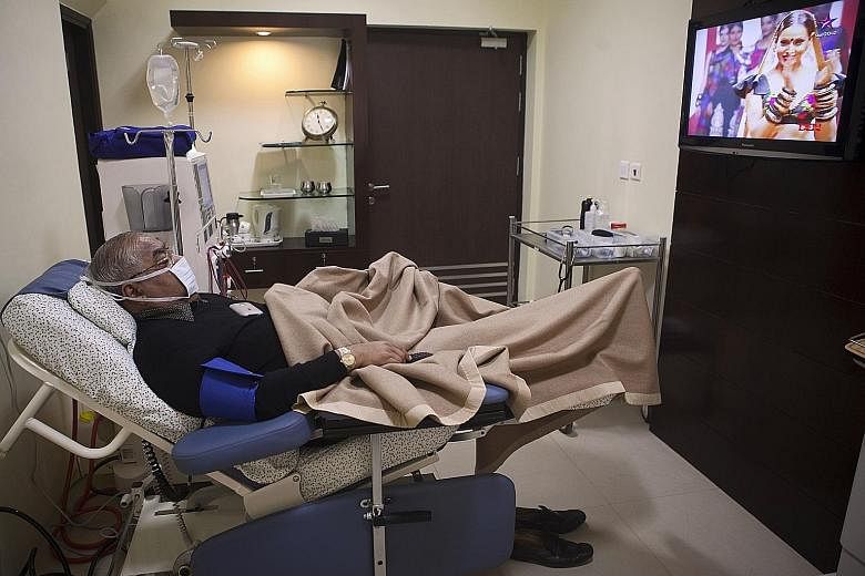 A patient at a dialysis centre of Fortis Healthcare (India) in New Delhi. Fortis Healthcare is India's second-largest private hospital chain.