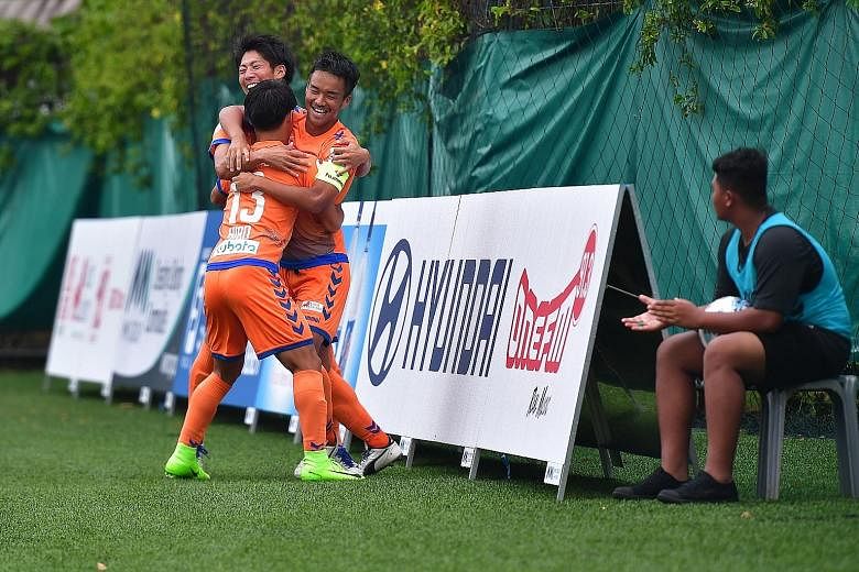 Albirex Niigata captain Wataru Murofushi (right) celebrating his goal against Brunei DPMM at the Jurong East Stadium yesterday evening. The defending champions are gunning for their third straight league title.