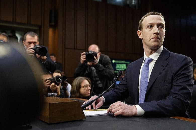 Facebook chief executive Mark Zuckerberg at a hearing in Washington last week. Mr Zuckerberg acknowledged Facebook had not done enough to protect private user data, but he also defended its opt-in provisions, which left it to users to decide what dat