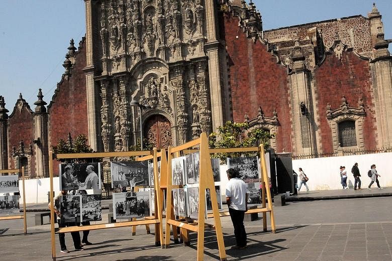 Above: The Zocalo or main square in Mexico City has ancient Spanish churches built on even more ancient Aztec ruins. By 2050, Mexico will be the seventh-largest economy in the world, but its fate has been and will continue to be linked to the US econ