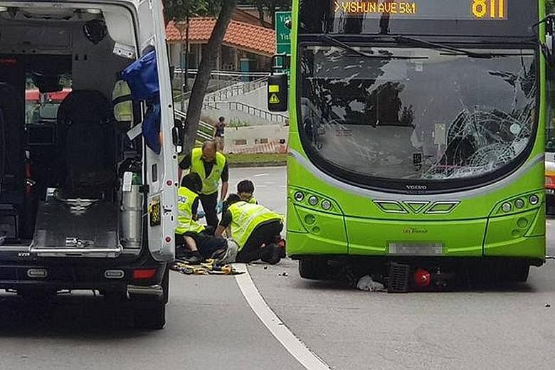 The 86-year-old e-scooter rider being attended to at the scene of the accident in Yishun. Police said he was "taken conscious to Khoo Teck Puat Hospital". The Straits Times understands the man had multiple injuries after he was involved in an acciden