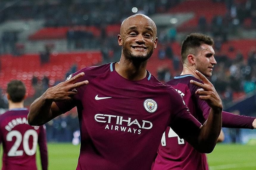 Manchester City captain Vincent Kompany celebrating with the crowd after the 3-1 Premier League win over Tottenham on Saturday.