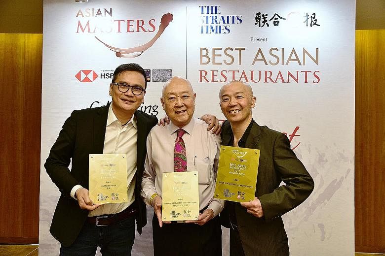 From left: Summer Pavilion's Chinese executive chef Cheung Siu Kong, 49, Imperial Treasure Fine Teochew Cuisine's group operation manager Jimmy Leung, 75, and Shinji by Kanesaka's master chef Koichiro Oshino, 48, who was named Chef of the Year, at th