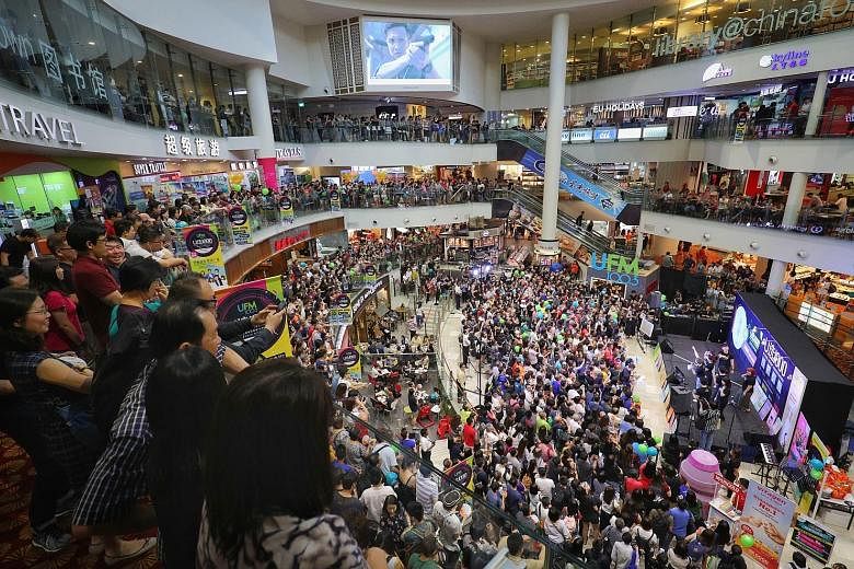 More than 3,700 music fans turned up at Chinatown Point mall for the announcement of SPH Radio station UFM100.3's top hits in the U1000 Music Countdown.