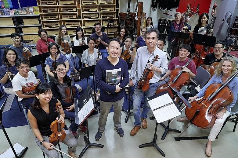 Home-grown chamber orchestra re: mix, led by its music director Foo Say Ming (standing, right), will perform the P. Ramlee Suite composed by Julian Wong (standing, left).